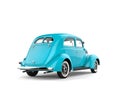 Bright pastel blue old vintage car - back view