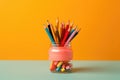 Bright pencils in holder isolated on colorful background. space for text. back to school concept