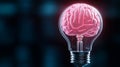 A bright pink brain inside a light bulb symbolizes creativity and inspiration on a dark background, copy space Royalty Free Stock Photo