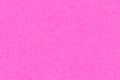 Bright pink felt textured fabric closeup background