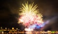 Bright pink and green fireworks in front of Quebec City Royalty Free Stock Photo