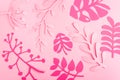 Bright pink leaves of paper on light pink