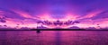 A bright  pink magenta coloured cloudy nautical coastal sunrise seascape in a purple sky. Queensland, Australia Royalty Free Stock Photo