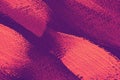 Random pink orange paint strokes on magenta purple canvas for vivid artistic abstract background Royalty Free Stock Photo