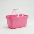 Bright Pink Rectangular Plastic Basket with White Handles on White Background Royalty Free Stock Photo