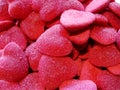 Bright pink red colored heart shaped gummy candies