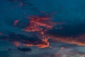 Bright pink sunset clouds on blue sky Royalty Free Stock Photo