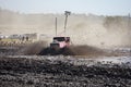 Bright pink vehicle mud racing