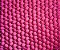 Bright pink uneven, bumpy background texture