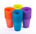 Bright plastic cups isolated on white Royalty Free Stock Photo