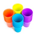 Bright plastic cups isolated on white Royalty Free Stock Photo