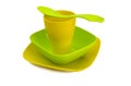 Bright plastic tableware isolated on white Royalty Free Stock Photo