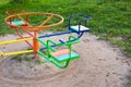 A bright playground, many different children's swings, a beautiful and cozy park for recreation. Royalty Free Stock Photo