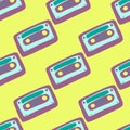 Bright pop seamless cassette pattern. Disco print with purple and blue colored ornament on yellow background Royalty Free Stock Photo