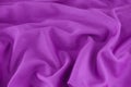 A bright purple wrinkled fabric texture background Royalty Free Stock Photo