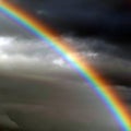 Bright rainbow against a stormy sky