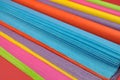 Bright rainbow colored reams (rolls) of tissue wrapping paper for gift wrapping