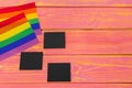 Bright rainbow gay flag on wooden background and blank space Royalty Free Stock Photo