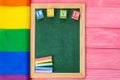 Bright rainbow gay flag on wooden background and blank space Royalty Free Stock Photo