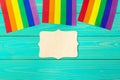 Bright rainbow gay flag on wooden background and blank space Royalty Free Stock Photo