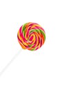 Bright rainbow round lollipop. Isolated on white background Royalty Free Stock Photo