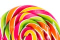 Bright rainbow round lollipop. on white background.Copy space Royalty Free Stock Photo