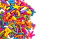 Bright Rainbow Sprinkles on a White Background Royalty Free Stock Photo