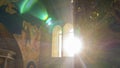 Bright rays of the sun beating in the window of the orthodox church. Religious and easter concept Royalty Free Stock Photo