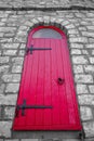 Bright Red Arched Door in Selective Colour