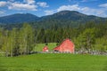Bright red barn in rural north Idaho Royalty Free Stock Photo