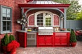 bright red beautiful summer kitchen with backyard grill