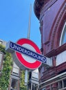 Bright red and blue London Underground sign Royalty Free Stock Photo