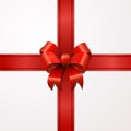 Bright red bow with tape on white Royalty Free Stock Photo