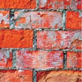 Bright red brick wall texture macro closeup, old detailed rough grunge cracked textured bricks copy space background, grungy Royalty Free Stock Photo