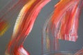 Bright red brush strokes on canvas. Abstract art background. Color texture. Fragment of artwork. abstract painting on canvas