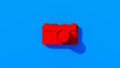 Bright Red Compact Camera Lens 1980\'s Style Vintage Vivid Blue Background