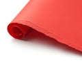 Bright red fabric rolled up with visible stitching Royalty Free Stock Photo