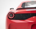 Bright red Ferrari 458 Italia sports car on a white background Royalty Free Stock Photo