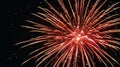 Bright red fireworks exploding in the night sky Royalty Free Stock Photo