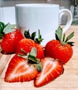 Bright red fresh cut strawberry breakfast or snack