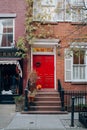 Bright red front door on a house in West Village, Manhattan, New York, USA Royalty Free Stock Photo