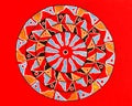 Bright red gel pen colorful hand drawn mandala.