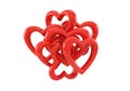 Bright red heart-shaped objects intertwined Royalty Free Stock Photo