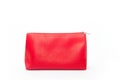 Bright red leatherette handbag on a white background
