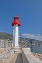Bright red lighthouse in Menton, France