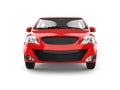 Bright red modern compact car - front view Royalty Free Stock Photo