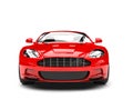 Bright red modern sports luxury car - front view Royalty Free Stock Photo