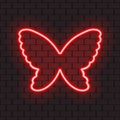 Bright red neon frame in shape of butterfly Royalty Free Stock Photo