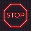 Bright red neon stop sign