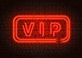 Bright red neon VIP sign with rectangle frame on brick wall Royalty Free Stock Photo